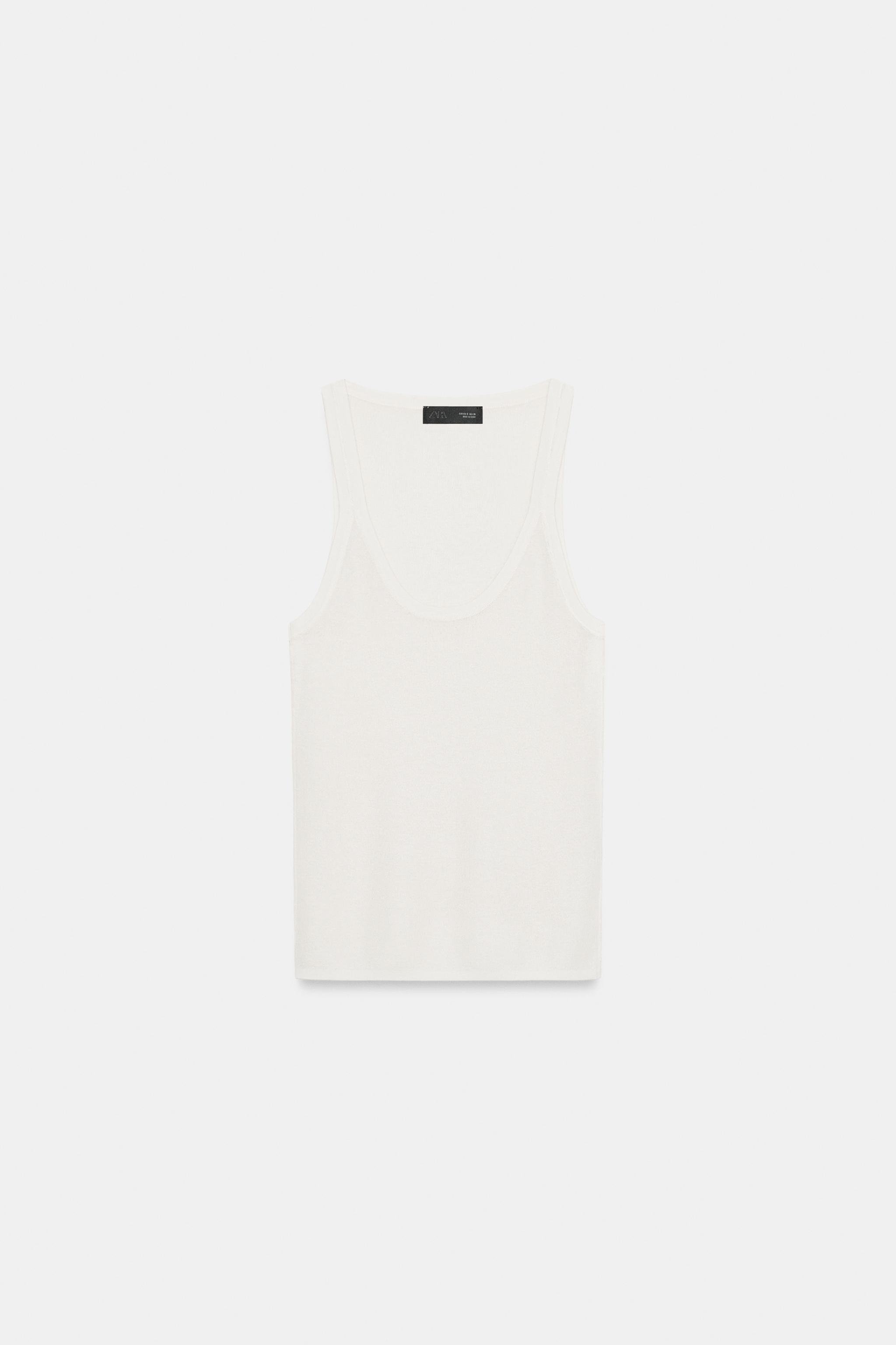 TOP EN MAILLE FINE SANS MANCHES